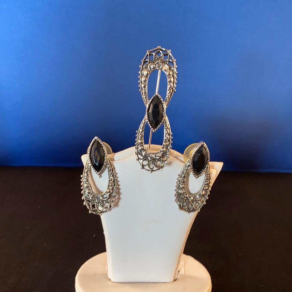 Silver toned and hematite Pin and earrings